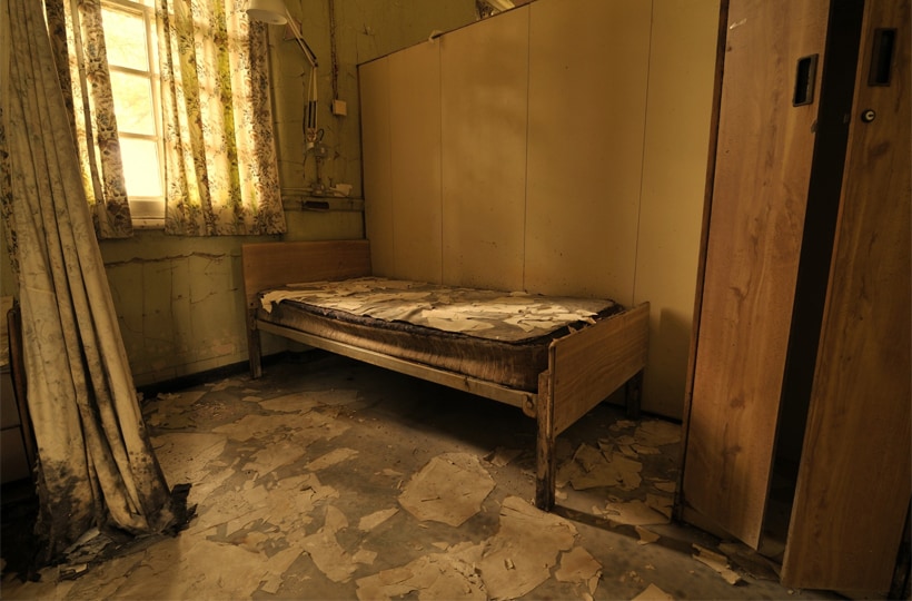 Abandoned asylum bedroom