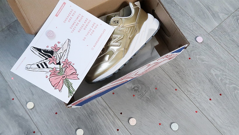 Gold New Balance in box