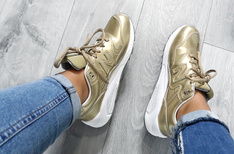 Vanessa Daniels wearing gold New Balance