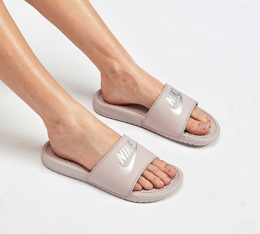 nike benassi slides on feet