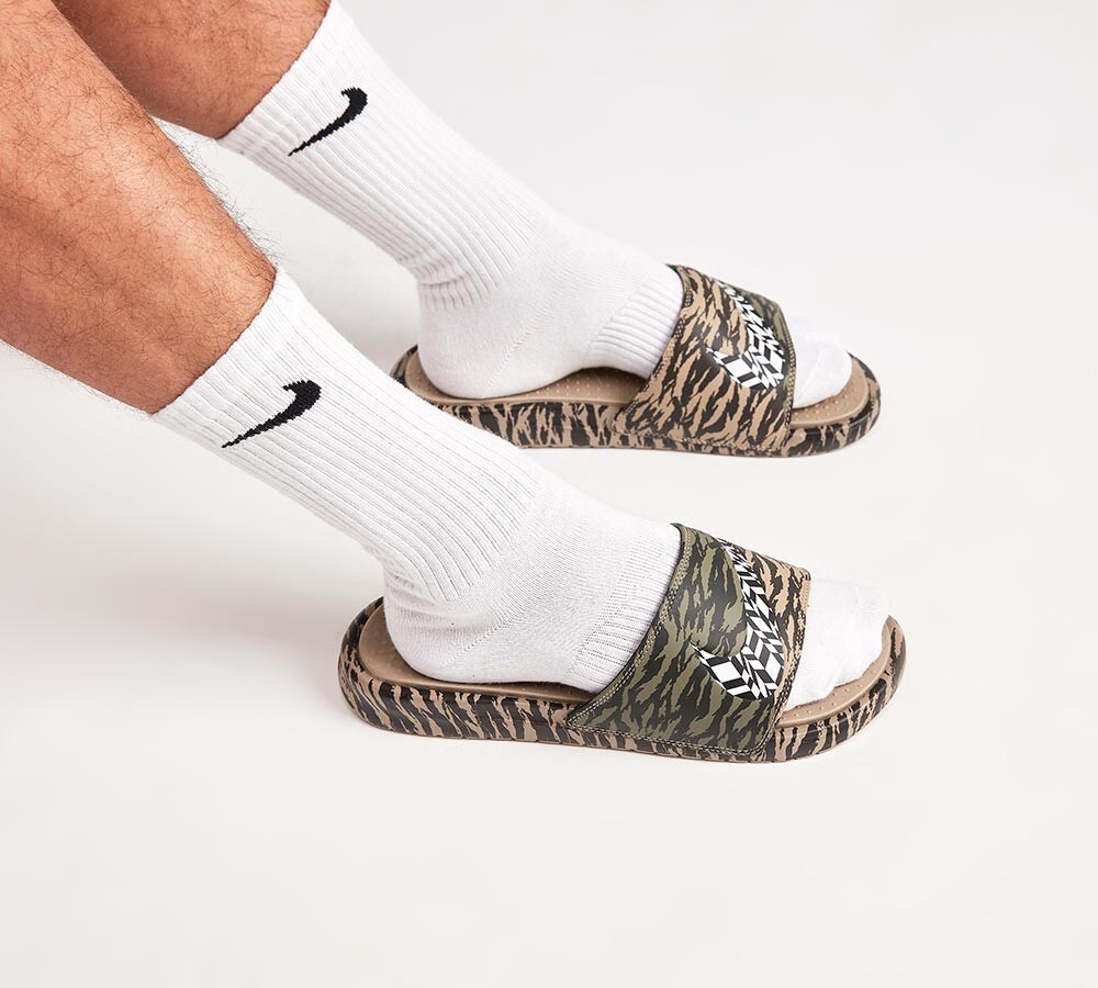 beige nike slides