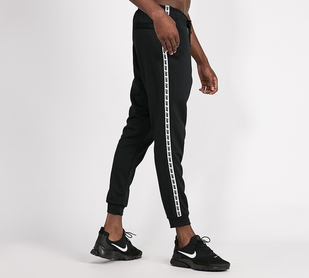 nike repeat tape track pants