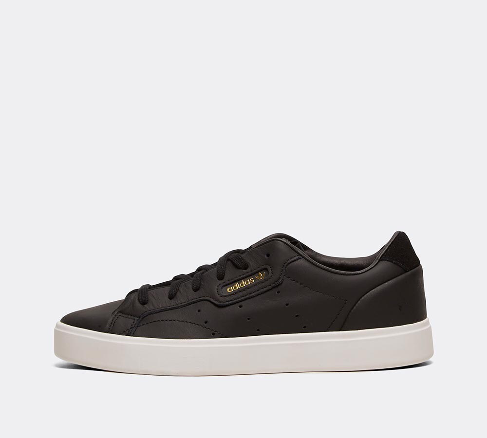 black trainers with white sole womens