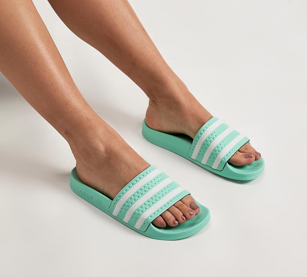 turquoise adidas slides