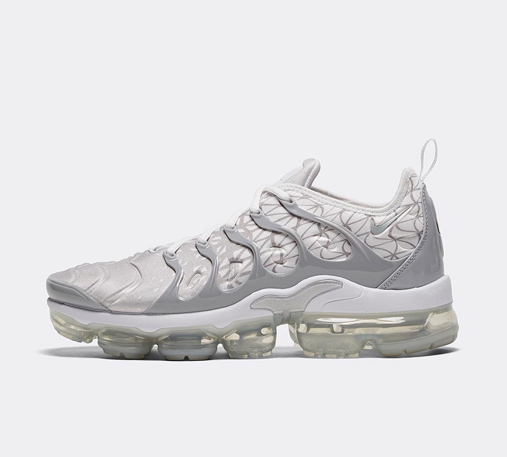 grey and white vapormax plus