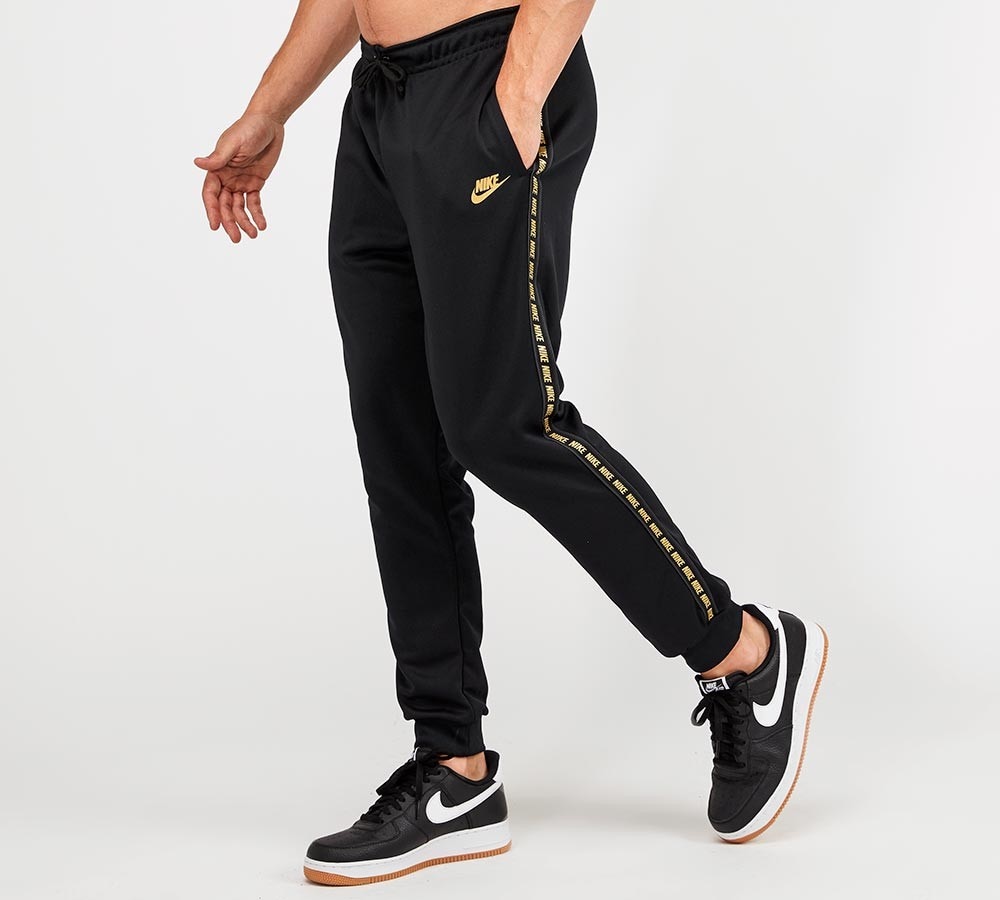 nike black and gold pants