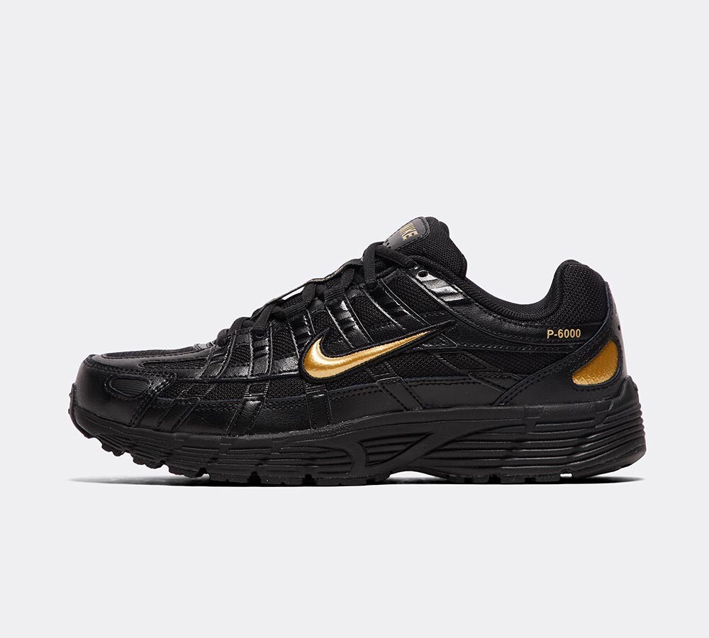 women's nike black and gold trainers