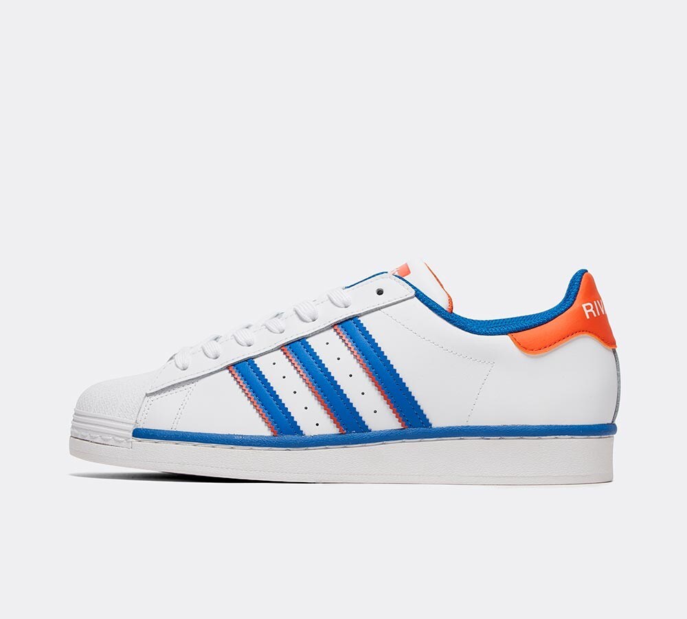 orange and white adidas superstar