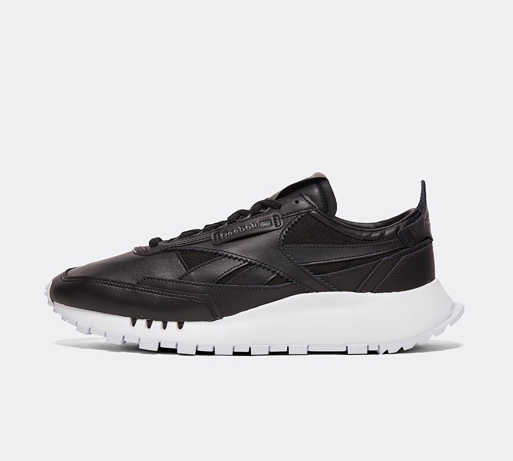 reebok trainers black and white
