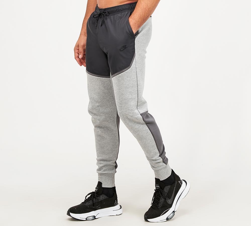 dark grey nike tech joggers