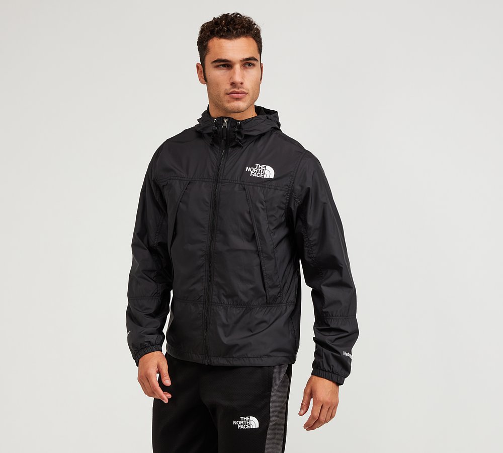 white and black north face windbreaker
