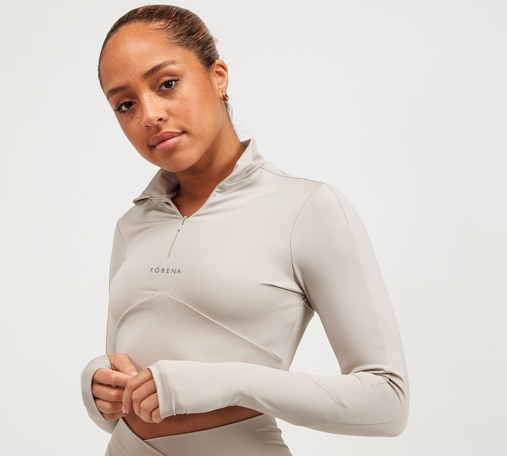nike air ribbed high neck long sleeve top beige