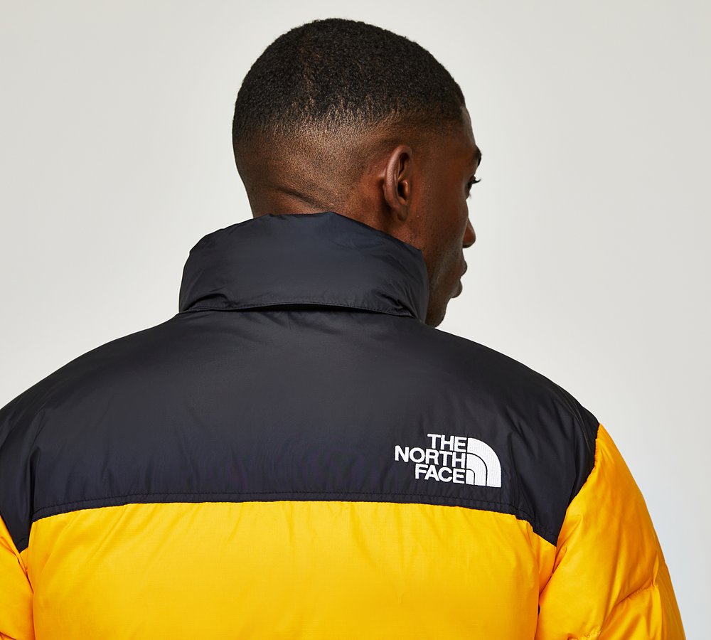 The North Face 1996 Retro Nuptse Jacket Summit Gold TNF Black Footasylum