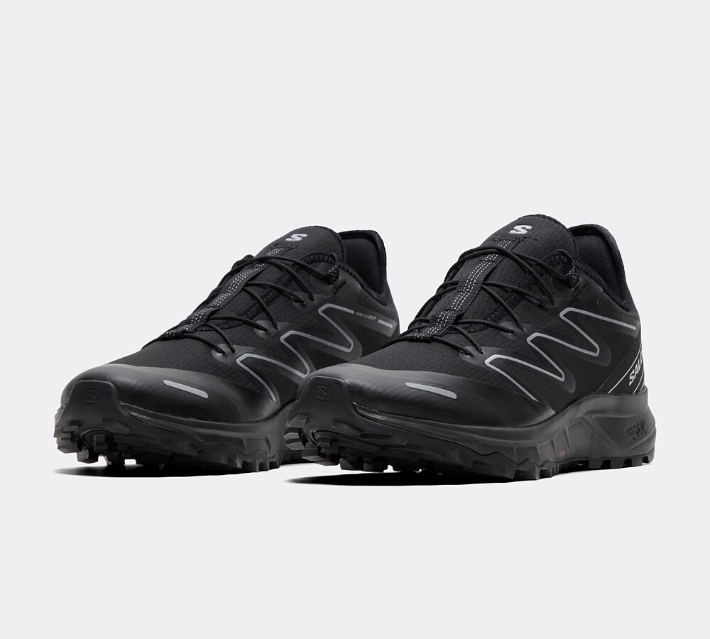 Salomon black best sale trainers