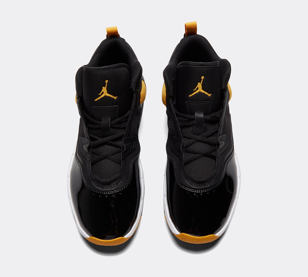 Black and yellow 11 jordans sales