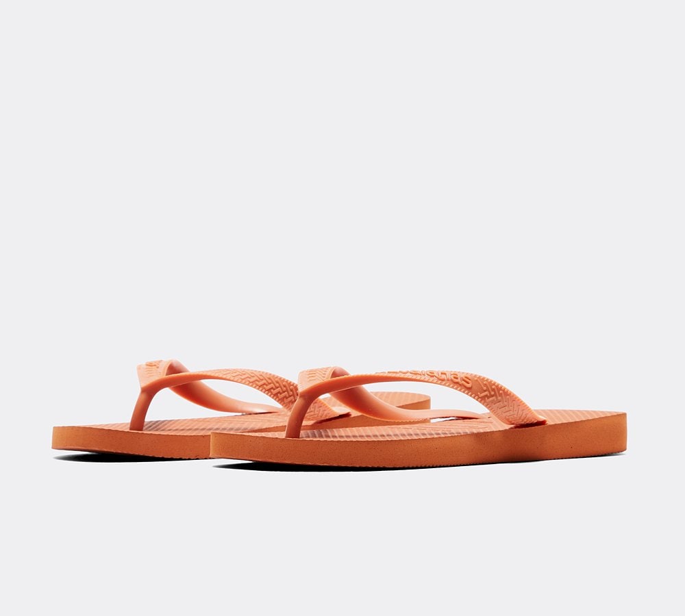 Orange flip flops on sale