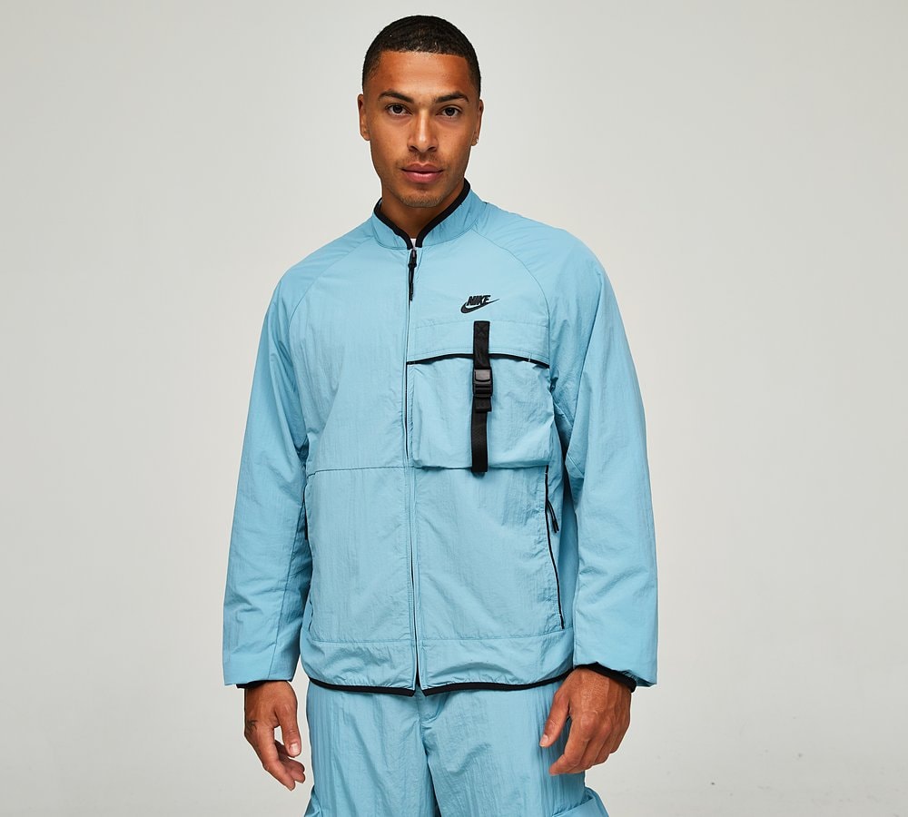 Nike turquoise windbreaker deals