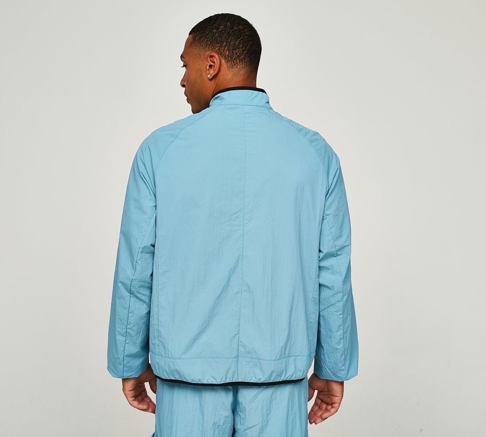 nike swoosh woven jacket teal