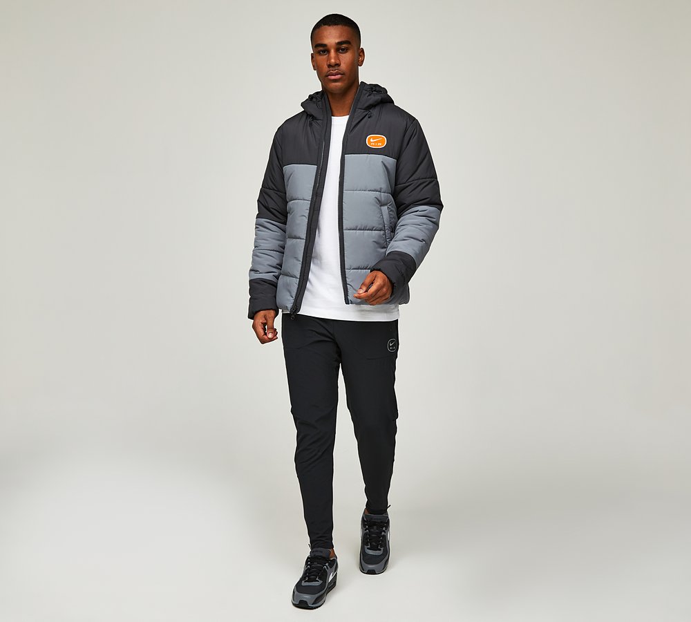 grey and orange nike windbreaker