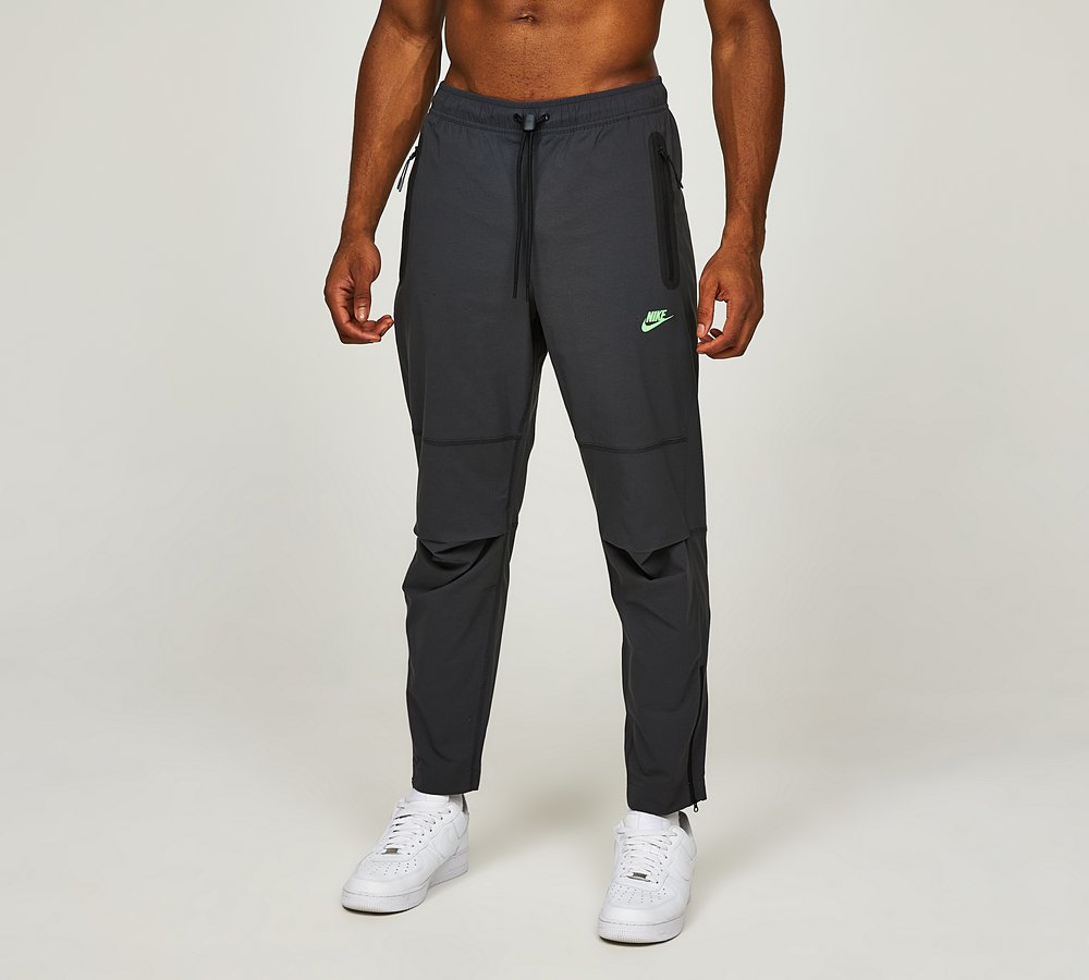 Nike Tech Woven Open Hem Pant | Anthracite / Green Strike | Footasylum