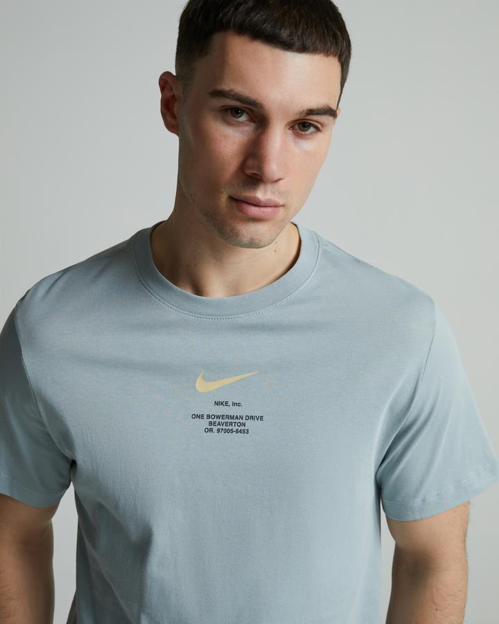 Nike Athletics Regular T-Shirt | Light Pumice | Footasylum
