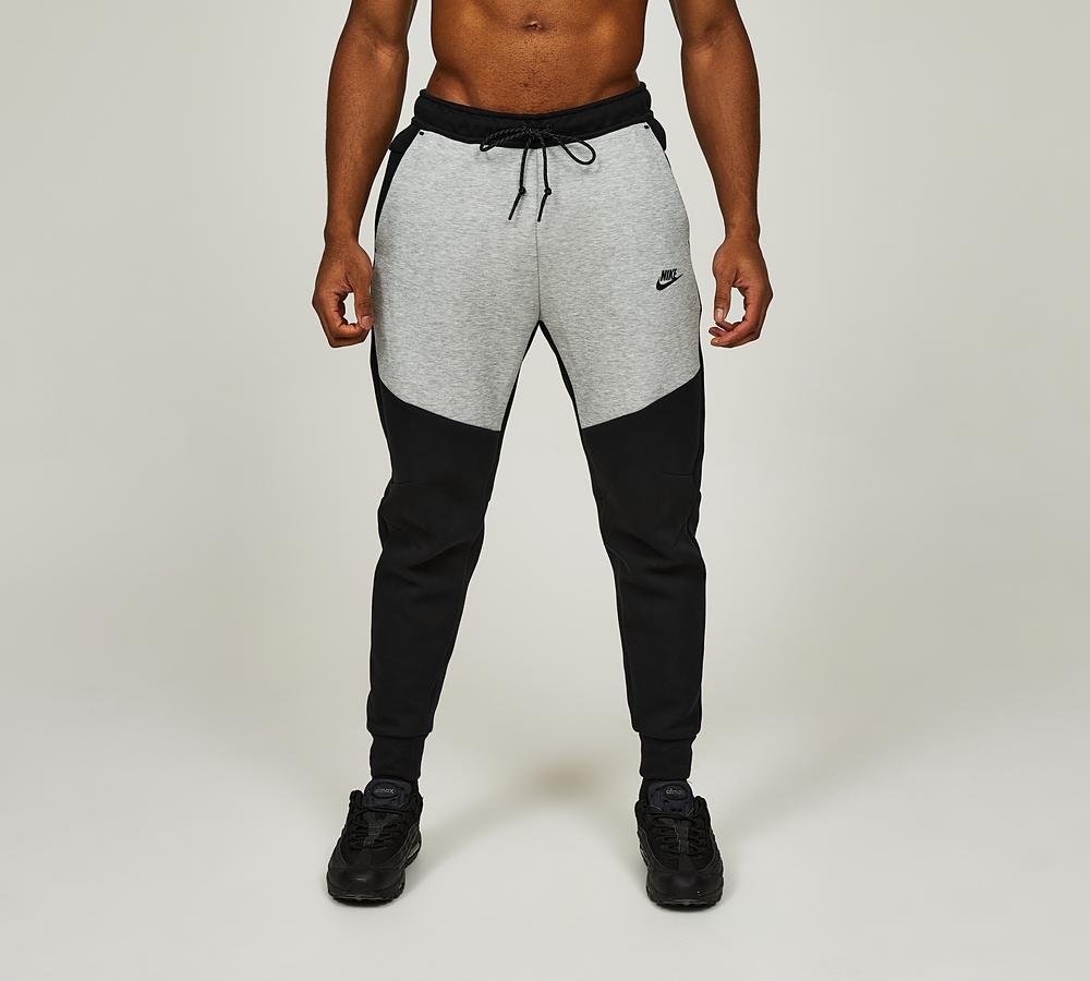 nike tech grey and black bottoms