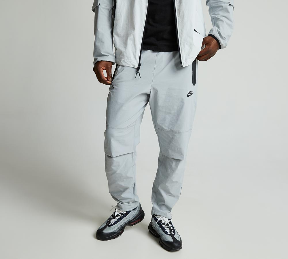 nike tech woven cropped pant