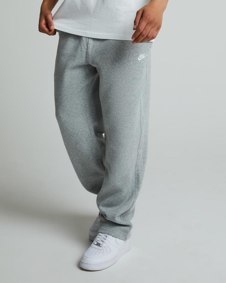 nike open hem club pants