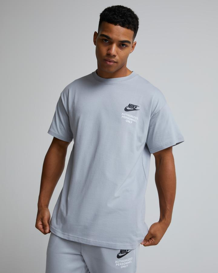 grey and blue nike shirt