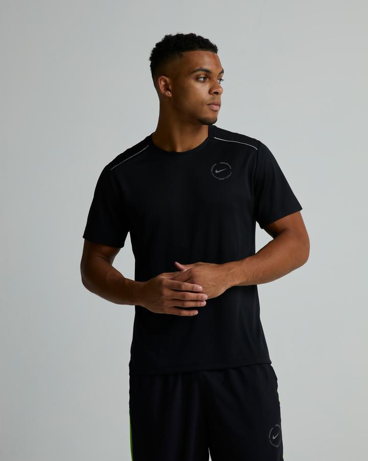 green strike nike shirt