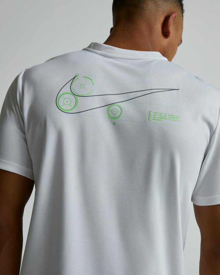 white and green nike shirt