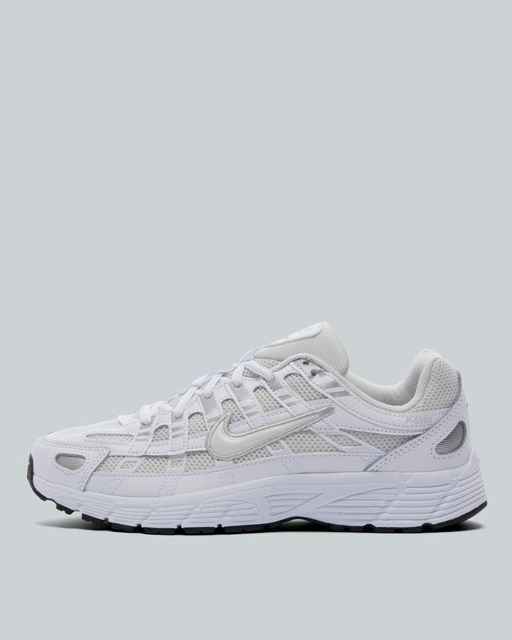 white junior nike trainers