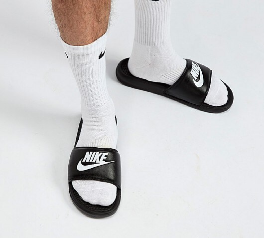 nike sandals on feet