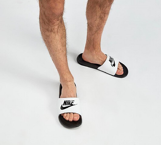 nike benassi slides on feet