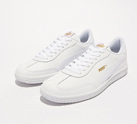 white puma leather trainers