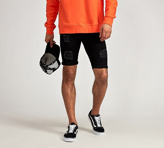 black ripped skinny shorts