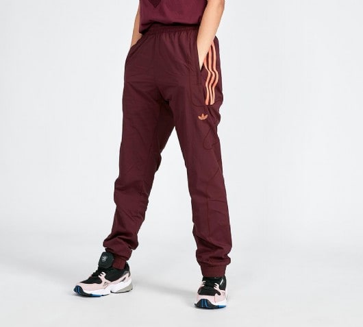 orange adidas track pants womens
