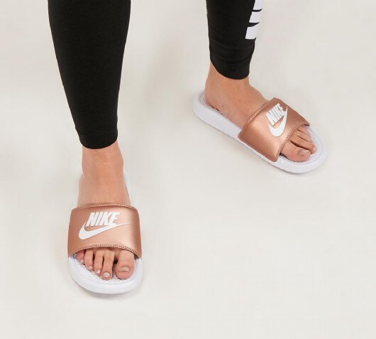 white nikes slides