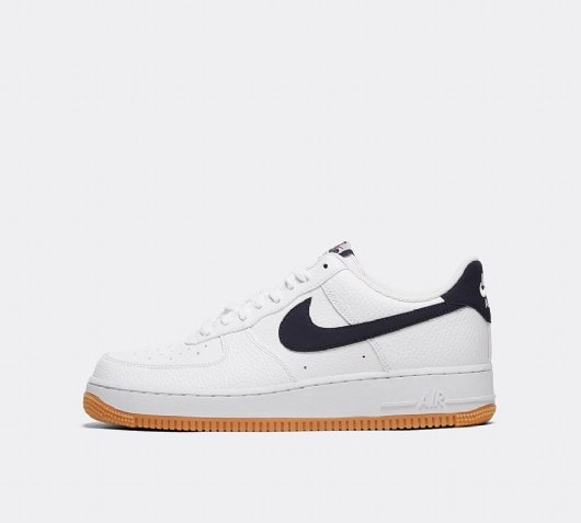 nike air force 1 trainers with navy swoosh and gum sole