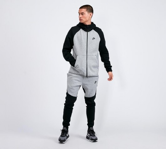 white and grey nike tech tracksuit