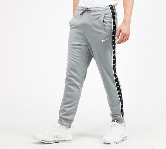 nike swoosh taped track pants black