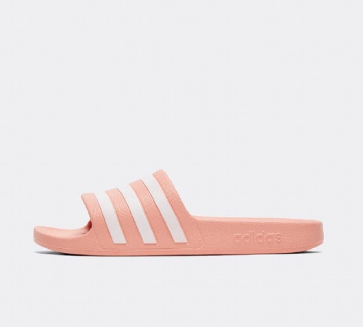 pink and black adidas slides