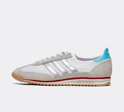 white and silver adidas trainers