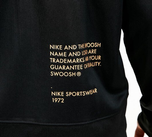 nike swoosh poly track