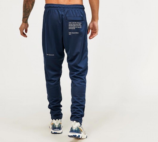 nike swoosh poly pants