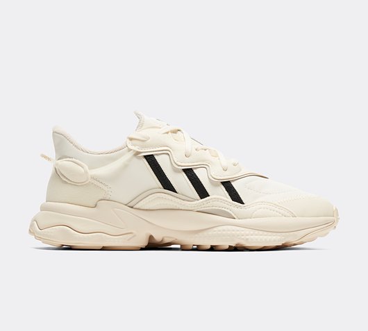 beige ozweego trainers junior