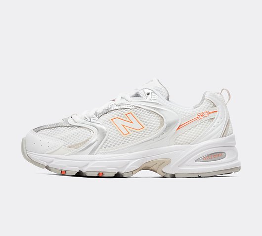New Balance 530 trainers in white and peach | MR530AC | FOOTY.COM