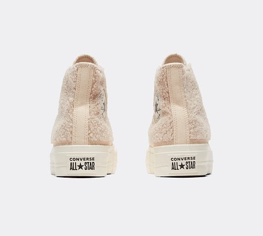 converse cozy club platform fleece sneakers in cream