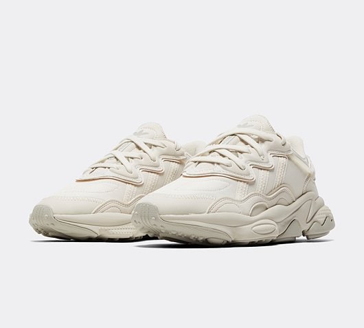 beige ozweego trainers junior