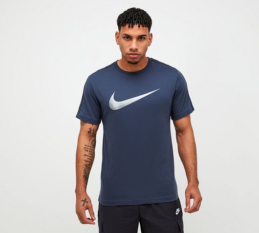 white and silver nike shirt